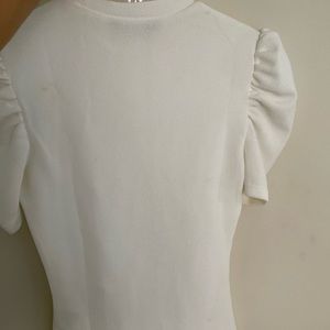 White shirt size xs . No tag and never been worn